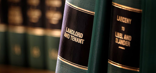 Close-up of legal book spines with gold-lettered titles, including “Landlord and Tenant” and “Larceny to Libel and Slander,” on a bookshelf. Can I Sue My Landlord for Personal Injury? Close-up of legal book spines with gold-lettered titles, including “Landlord and Tenant” and “Larceny to Libel and Slander,” on a bookshelf. Can I Sue My Landlord for Personal Injury?