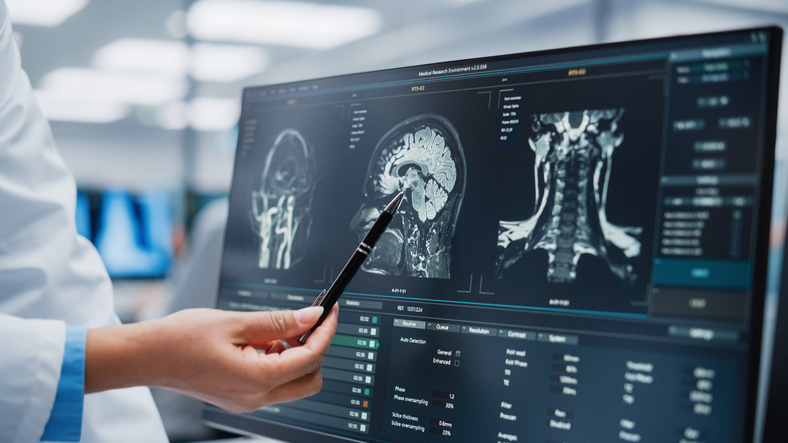 Neurologist and Neurosurgeon Talk, Use Computer, Analyse Patient MRI Scan.